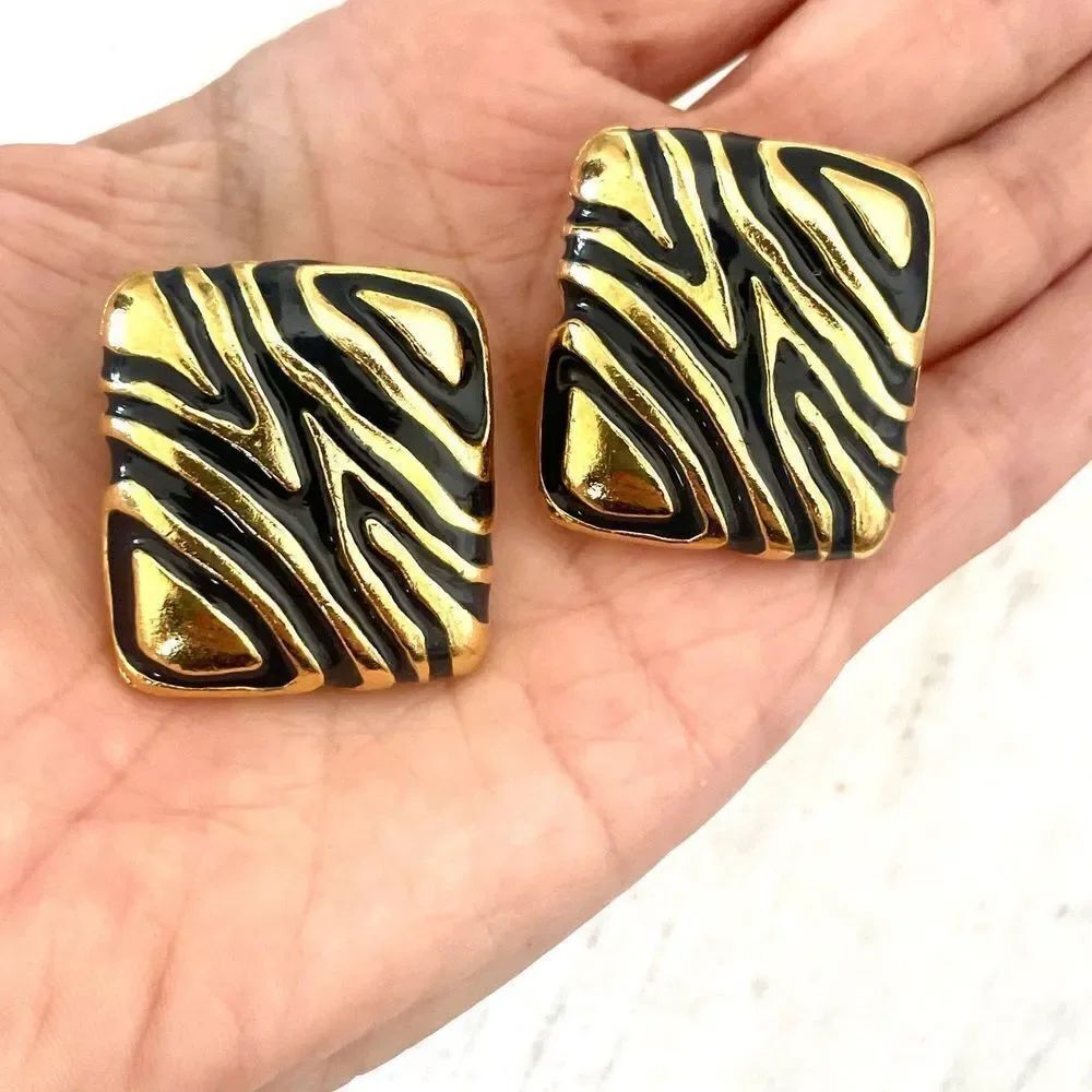 Large square gold tone and black clip on earrings